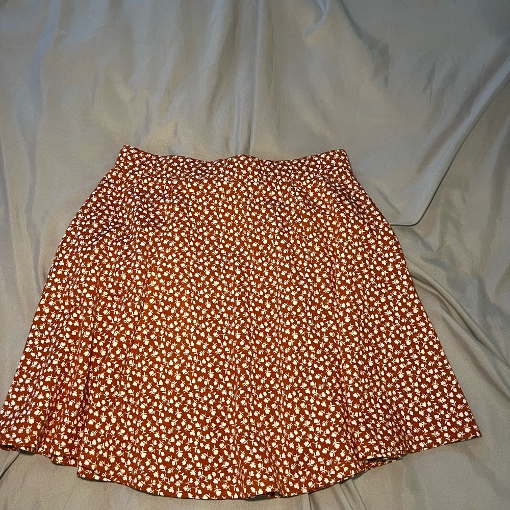 Orange and white flower print skirt